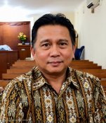 TN. JOHNY MELIANGAN, SE