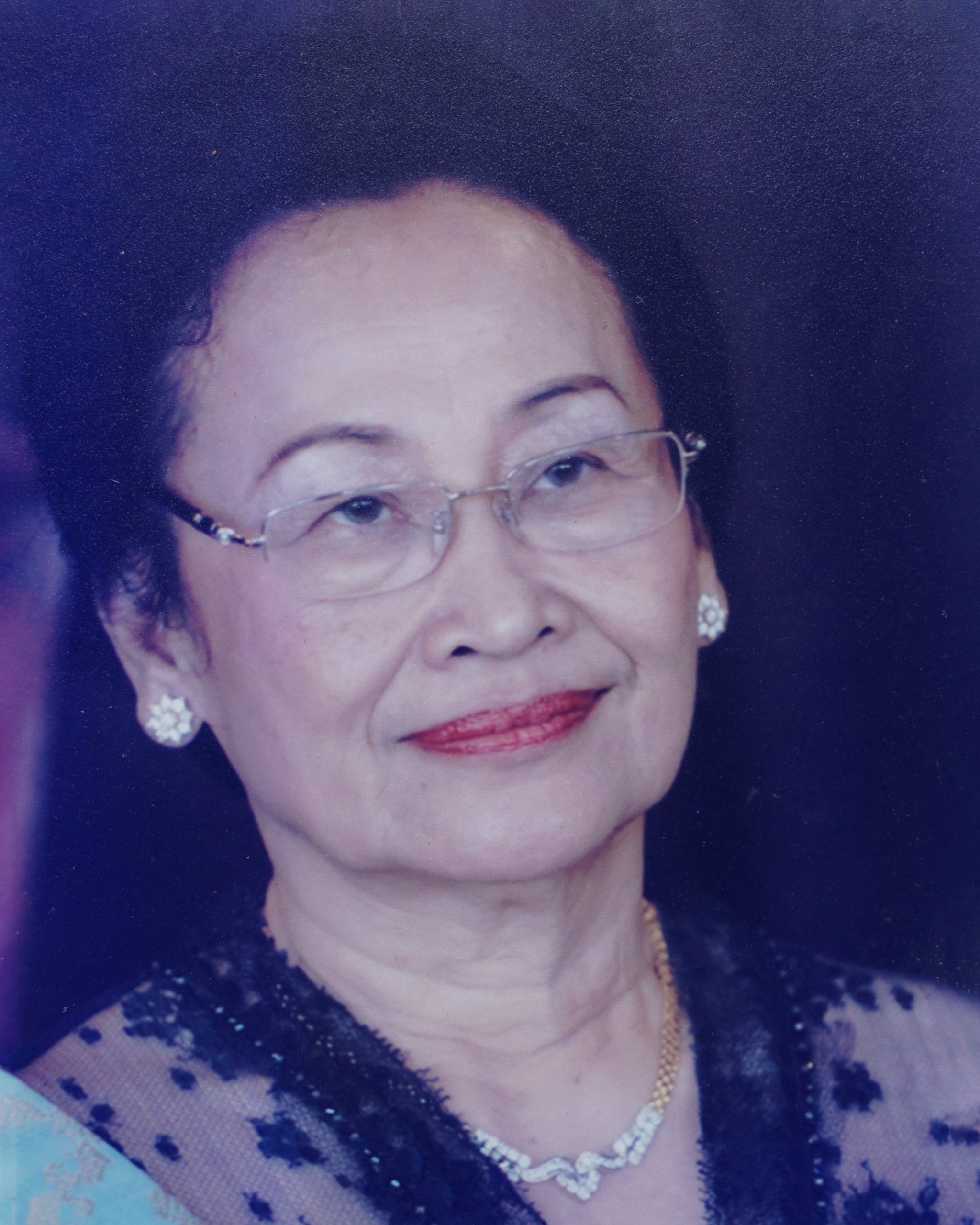 Ny. Purnama M. J  Pinem