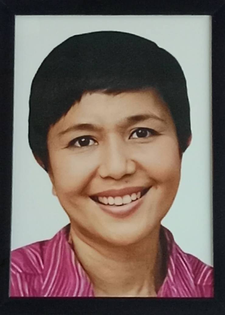 Ny. Ferdinanda Modok Raubun