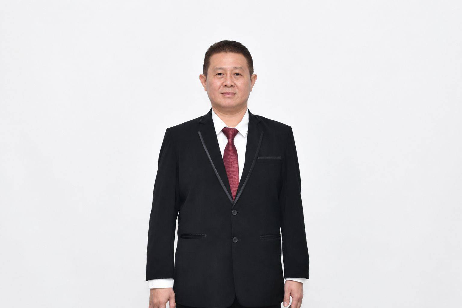 Tn. Herman Kuwon