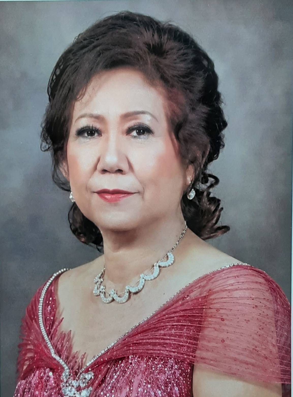 Evia Tuti Gunarjanti ( Tan Sien Nio )