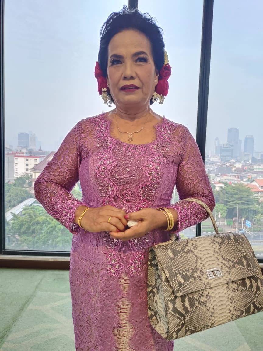Ny. Siahaan Riamasniari br Sitompul (Op. Gavra)