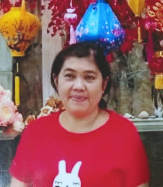 Ny. Tan Surianawati