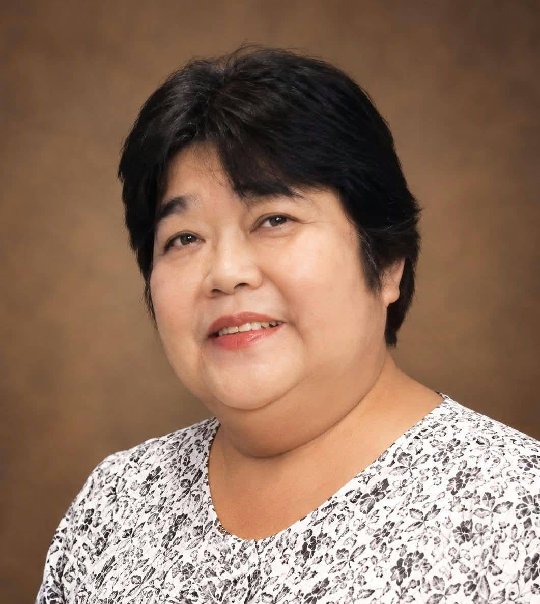 Ibu  LESLI DARMAWAN